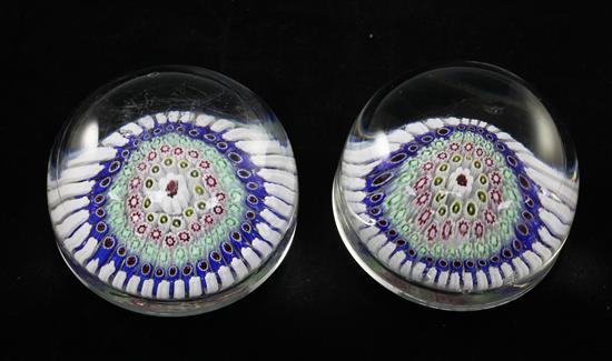 A pair of English millefleur magnum paperweights, mid 19th century, 9.2cm